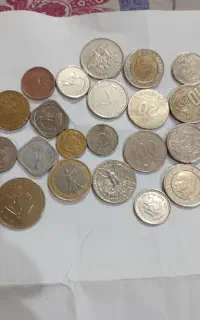 حدود صد عدد سکه خارجی و شاهی و جمهوری