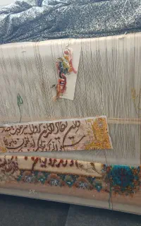 قالی وان یکاد