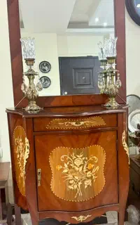 آینه کپسول و شمعدان