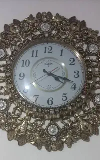 ساعت . سطل . جا دستمال