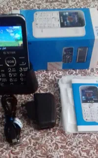 گوشی G.STAR با پایه شارژر