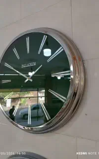 ساعت دیواری فلزی پالادیوم لوکس مدرن با کالا برگ