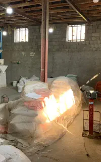 کارگر کارخانه برنجکوبی