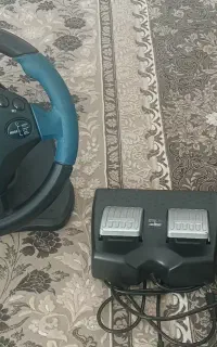 پلی ۲ همراه با فرمان و پدال بازی