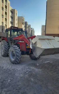 کار با تراکتوربیل لودری ساعتی و روزانه