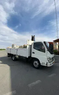 فوتون ۶ تن به شرط