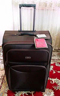 مانتو و چمدان بزرگ  مسافرتی اک مارک MEIQITUN