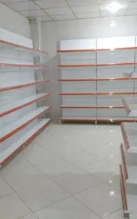قفسه‌بندی و میز چک‌اوت فروشگاهی