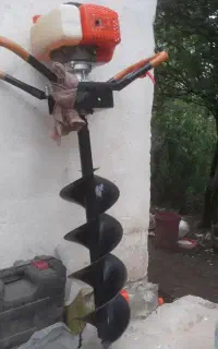 دستگاه علف زن و چاله کن