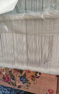 قالی نیمه بافته