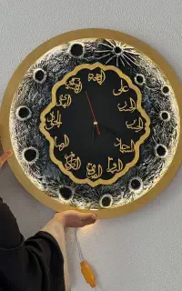 ساعت دیواری طرح ماه با نام ۱۲ امام مدل نوری