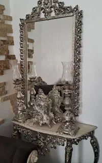 آینه و شمعدان وساعت