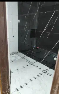 کاشی کاری و لکه کاری ساختمان