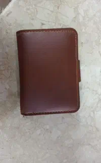 یک عدد کیف مشکی به همراه کیف مدارک