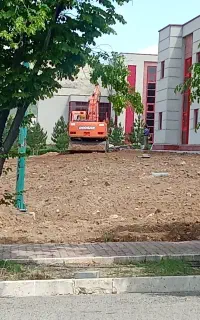 راننده بیل مکانیکی لاستیکی