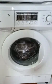 لباس شویی اسنوا ۷ کیلو