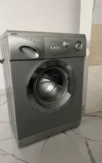 ماشین لباسشویی پنج کیلویی اسنوا