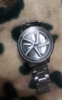 ساعت رینگی مامله با پرندده