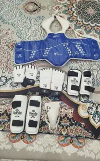 لباس و وسایل مبارزه تکواندو