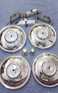 لوازم نیسان قالپاق و آینه استیل