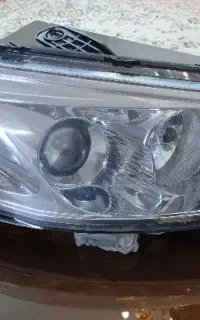چراغ جلوی رانا سمت شاگرد  و  یک عدد چراغ مه شکن