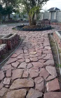 اجرای محوطه سازی  سنگ کوهی آبنما و کارهای بنای