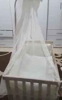 گهواره کنار مادر نوزاد در حد صفر