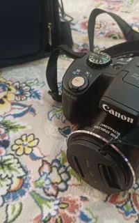 دوربین کنون x50