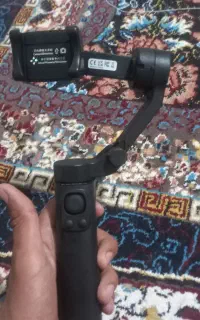 گیمبال موبایل همراه با سه پایه کوچک کارتون