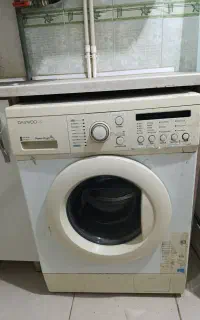 لباسشویی دوو همراه بااجاق گازکاملا سالم میزتلوزیون