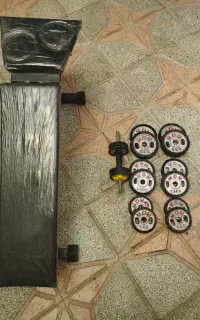 دستگاه بدن سازی و دمبل