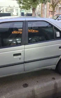 پژو۸۷ دوگانه شرکتی داخل کرم