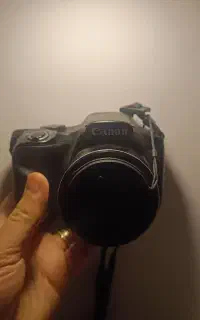 دوربین اورجینال کنون sx520hs با جعبه و لوازم جانبی