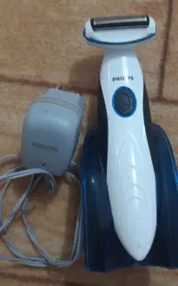 ماشین اصلاح موی بدن فیلیپس و سنگ پای برقی