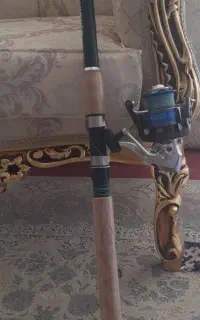 2 عدد چوب و چرخ ماهیگیری نو
