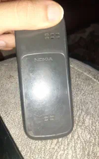 یک تبلت Lenovo یک عدد نوکیا ۱۱۰۰