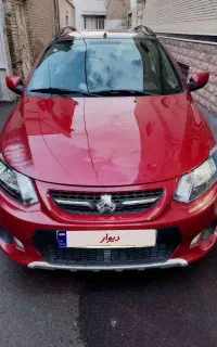 کوئیک آر ۱۴۰۰r قرمز مشکی پارس خودرو