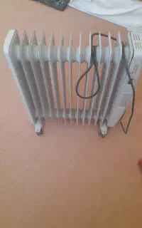 یک بخاری برقی رادیاتور