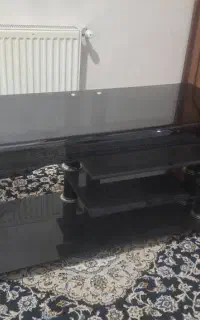 زیر تلویزیون شیشه ای