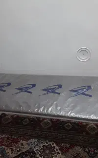 تخت معاینه پزشکی و سالنی