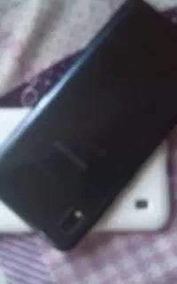 گوشی سامسونگ a10sوکولر ابی وسفیدوپکنیک
