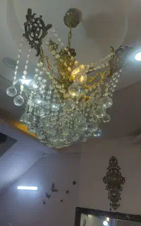 لوستر برنز و ساعت و میز