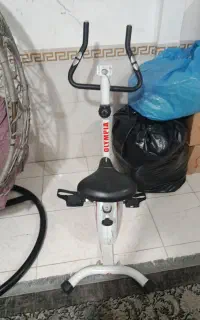 دوچرخه ورزشی ثابت خانگی  و یه دراز نشست