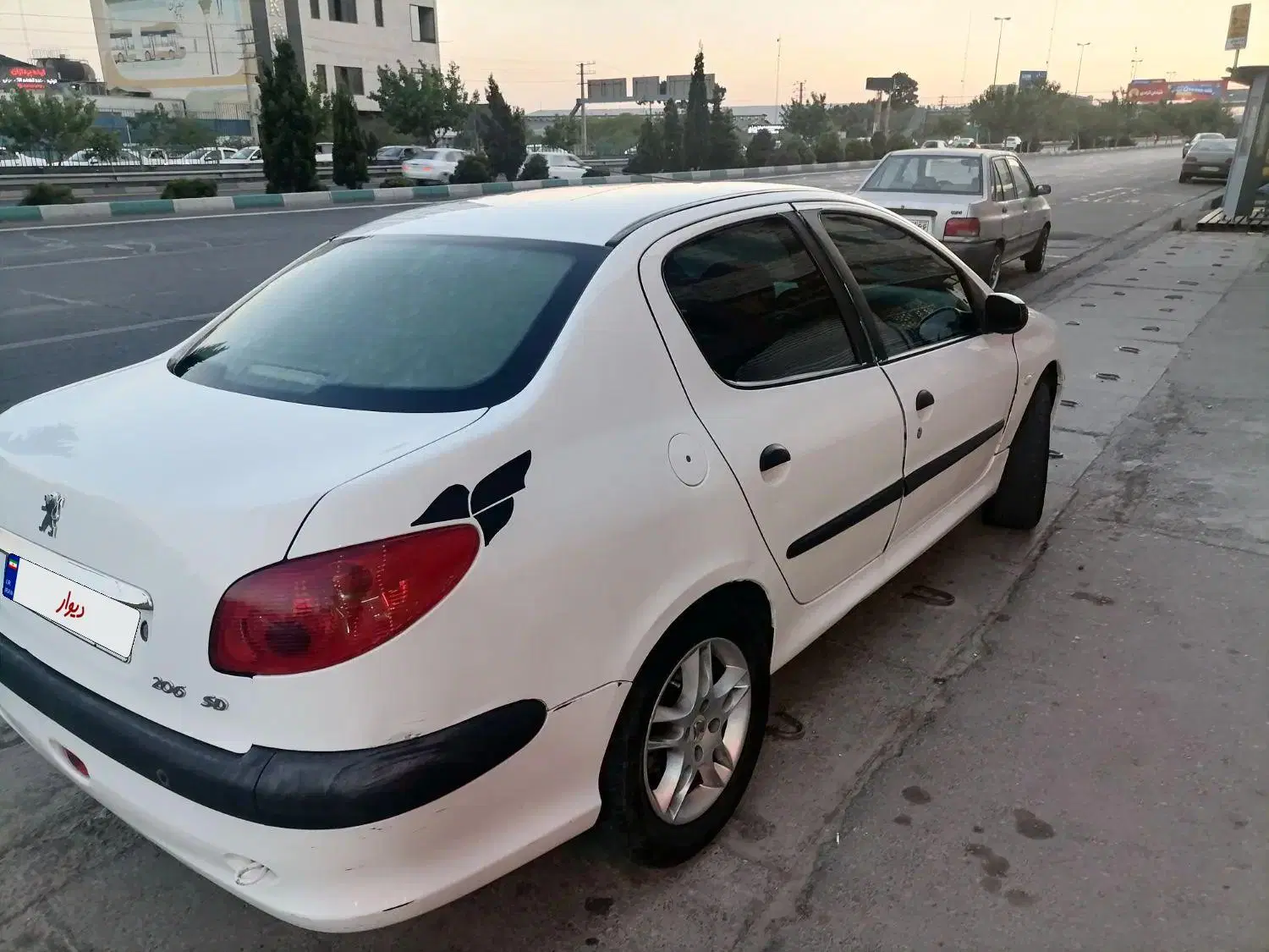 206 SD V8|خودرو سواری و وانت|پرند, فاز ۵|دیوار