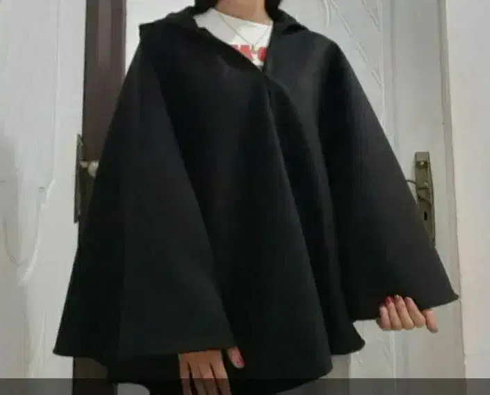 شنل|لباس|قم, طلاب غیر ایرانی|دیوار