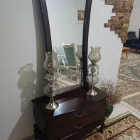 اینه و کنسول و شمعدانی