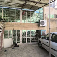 خانه-دوطبقه-با-حیاط-اختصاصی-در-دو-طبقه-جهت-کارگاه