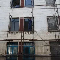 پیچ‌ ورولپلاک سنگ‌‌ نما همراه باداربست