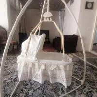 گهواره و جامپر نوزاد