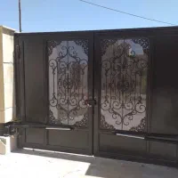 تعمیر جک در پارکینگ درب برقی کرکره ریموتی